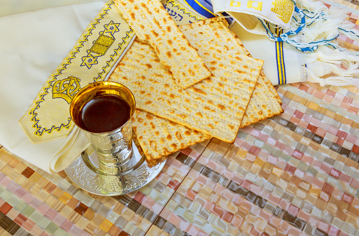 Matzo and Kiddush Cup on the table for Passover celebration