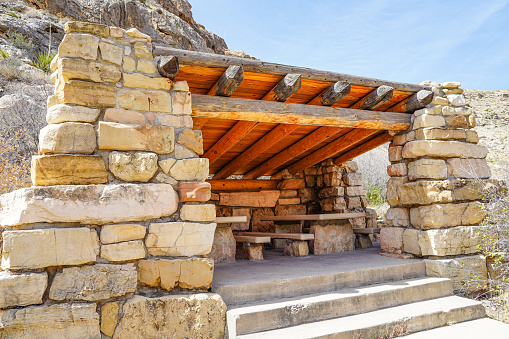 Close-up of a picnic table shelter at Sitting Bull Falls, under the US Department of Agriculture, at Lincoln National Forest, a national park covering 1.1 million acres and three mountain ranges in southeastern New Mexico administered by the US Forest Service.