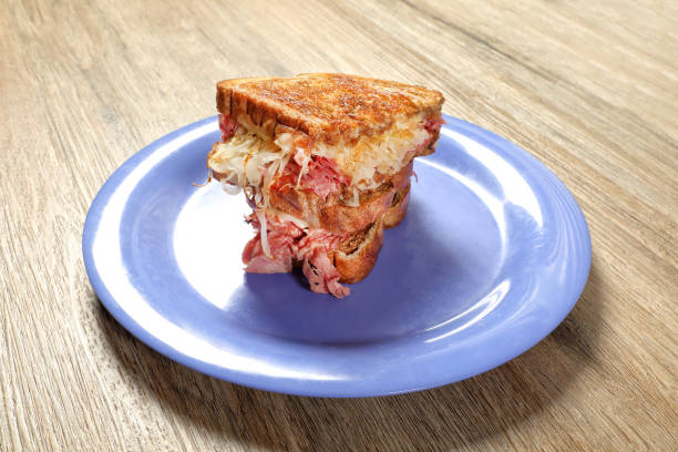 istock Toasted sandwich in plate on wooden table 2087741473