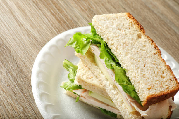 istock Chicken and cheese sandwich dish on wooden table 2087764097