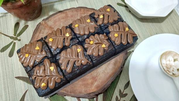 istock fresh chocolate brownies with nutella sauce. 2087816627