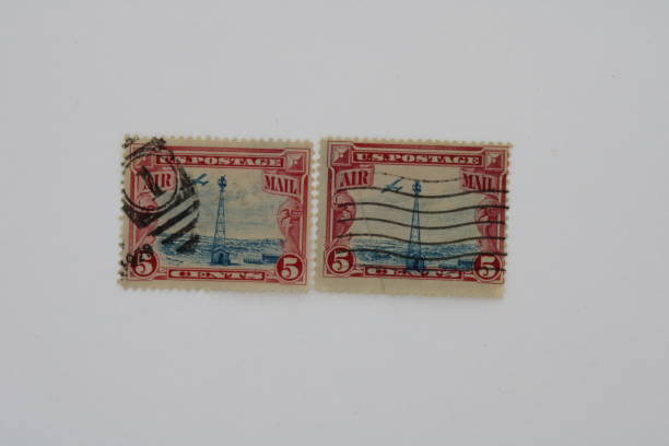 This red and blue, five cent stamp depicts an airplane and is an air mail stamp