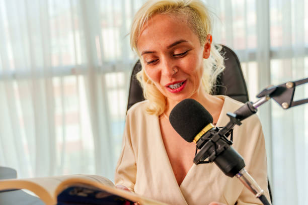 istock young woman recording podcast 2087917231