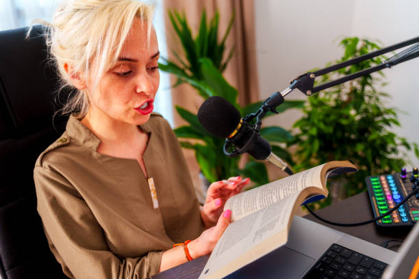 istock young woman recording podcast 2087918273