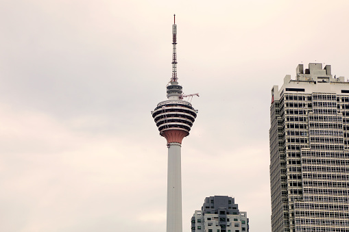 Cityscape and Menara Kuala Lumpur Tower over sky in Malaysia