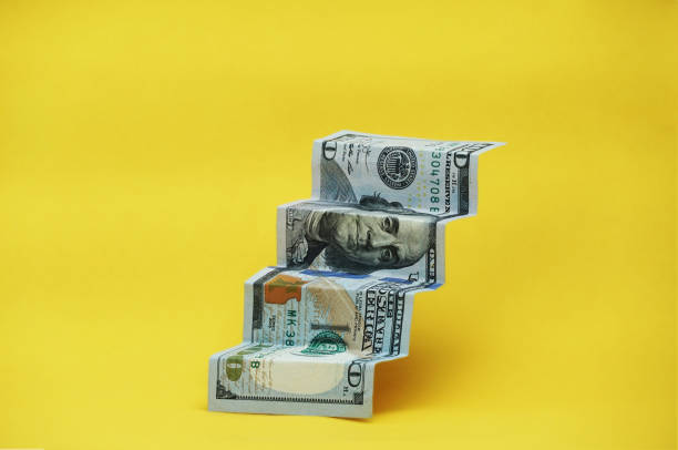 istock 100 US dollar stairs to success. 2088014578