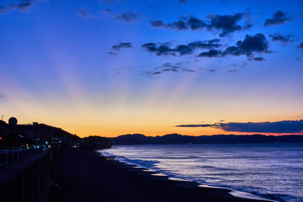 istock Scenic view of beach during sunrise 2088077096