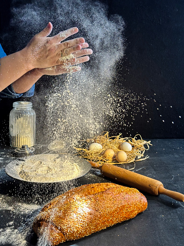 Hands cooking dough