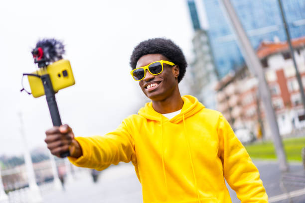 istock African young influencer broadcasting live in the city 2088099355
