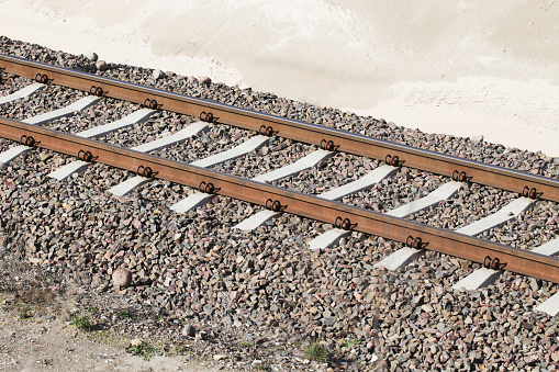 Track ballast gravel made of crushed stone.