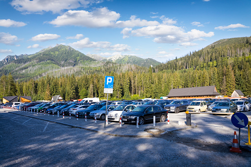 Huge parking lot in Palenica Bialczanska, Tatra Mountains, Poland. This is the last parking lot on the way to Morskie Oko lake