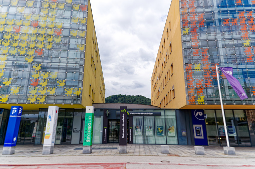 Modern colorful office buildings at Slovenian City of Kranj on a cloudy summer day. Photo taken August 10th, 2023, Kranj, Slovenia.