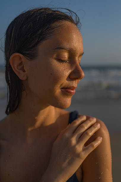 istock Young woman enjoys beach 2088239659