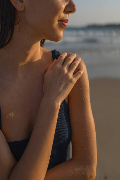 istock Young woman enjoys beach 2088239660