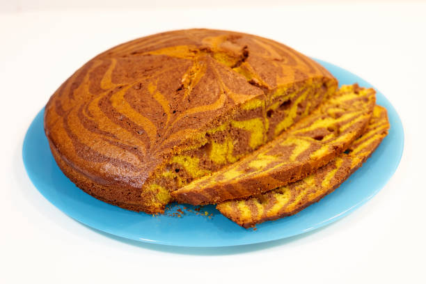 istock A slice of cake with a blue plate on a white background 2088258511