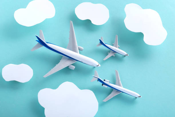 istock Airplane and clouds in the blue sky 2088283851