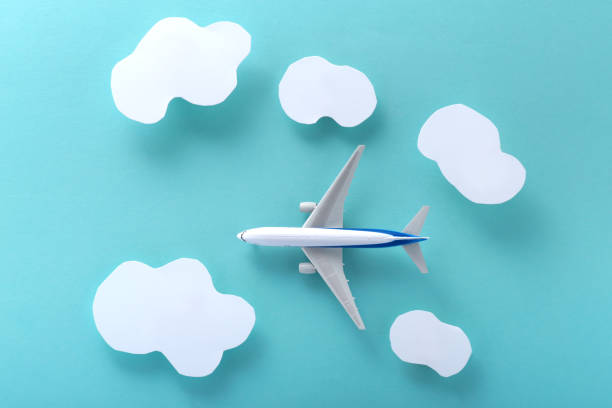 istock Airplane and clouds in the blue sky 2088283853
