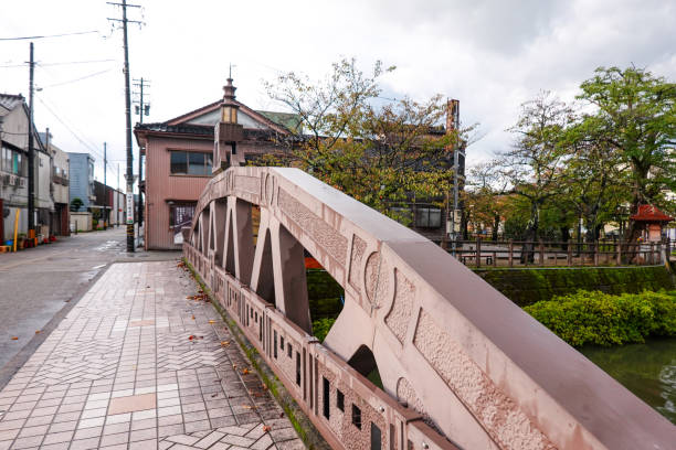 The reconstruction bridge on Ninja Hattori-kun Road over the Minato River in Himi City, Toyama Prefecture, on a sunny day in October 2023.