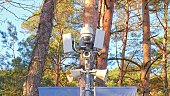 Public Area Surveillance System with CCTV Cameras and PA Speakers Installed in Park