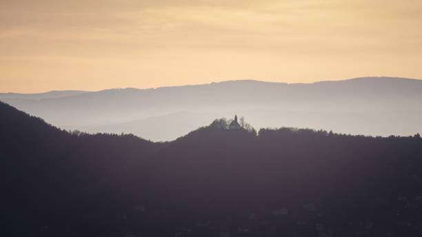 istock Mountain silhouettes at sunset. 2088300112