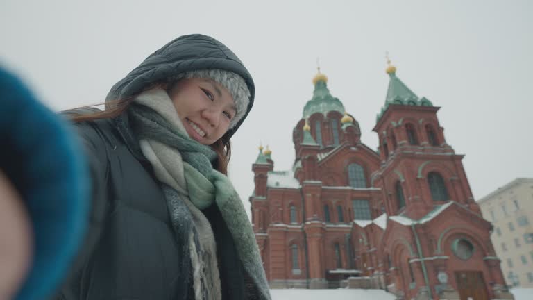 Tourists Travel To Uspensky Cathedral In Helsinki, Finland