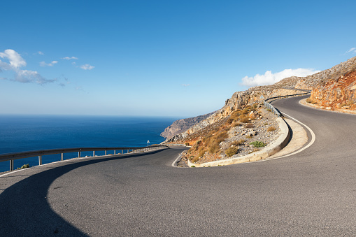 Winding mountain road to the sea (South Crete, Tris Ekklisies, Greece).
