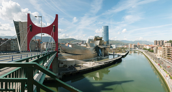 Bilbao, Spain - October 7, 2015: View of Guggenheim Museum Bilbao, designed by the architect Frank Gehry. The museum is a mayor tourist attraction in Bilbao and an architectural milestone
