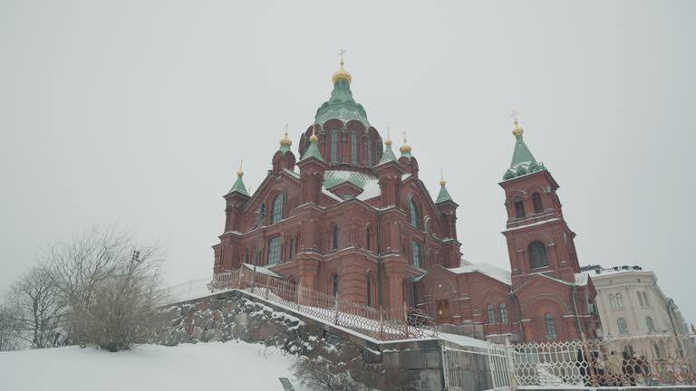 Tourists Travel To Uspensky Cathedral In Helsinki, Finland