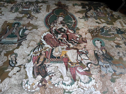 Old painted wall at Huayan Temple, a Buddhist temple located in Datong, Shanxi, China. It is an artistic complex of ancient Chinese architecture, sculpture, frescoes and inscriptions, as well as a cultural synthesis of religion and politics.