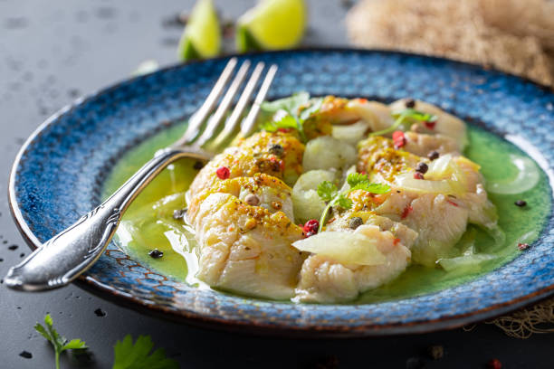 istock Tasty marinated fish with onion and pepper. 2088381046