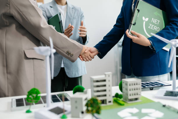 istock Business team people planning hand using laptop for working technology and business Net zero and carbon neutral concept.NET ZERO icons 2088388787