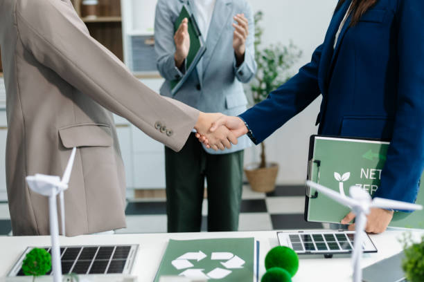 istock Business team people planning hand using laptop for working technology and business Net zero and carbon neutral concept.NET ZERO icons 2088388793