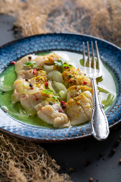 istock Healthy marinated fish serving with lime and coriander. 2088395237