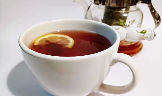 Directly above view of herbal tea with lemon slice.