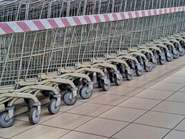 istock trolleys for goods stand in a supermarket 2088500029