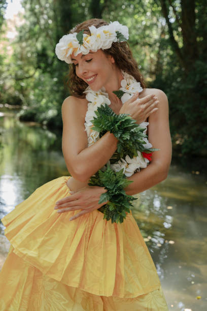 istock Graceful young lady dancing Hawaiian dance. 2088511764