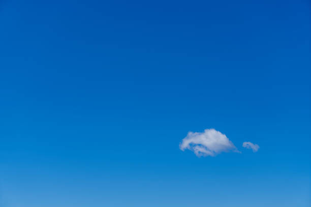 istock Single cloud in blue sky over Liberty island, New York 2088553615