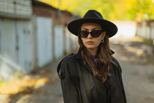 Woman in black coat. Street style