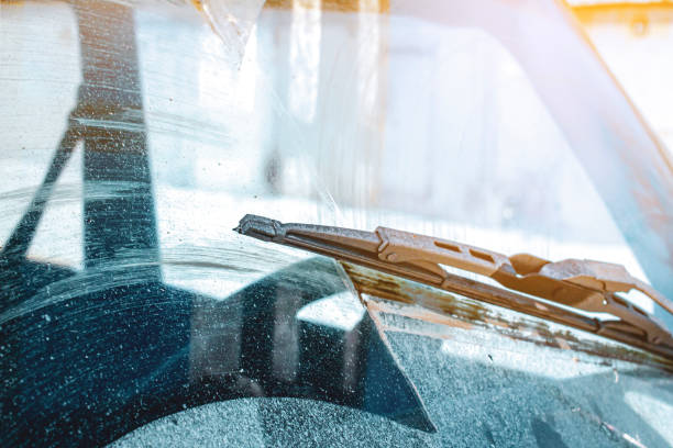 istock Windshield wipers from inside of car, season rain. 2088593591