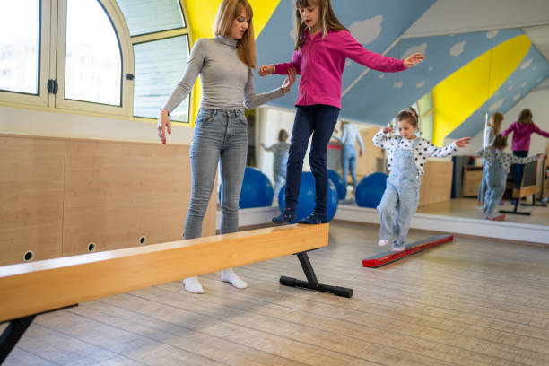 istock Physical therapist working with kids 2088614894