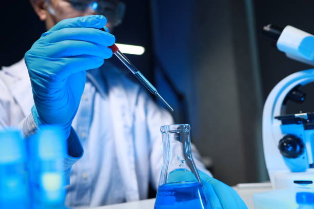 istock A chemist is testing a newly discovered chemical using a variety of scientific equipment in his lab, The working atmosphere in the laboratory while scientists are doing research. 2088620471