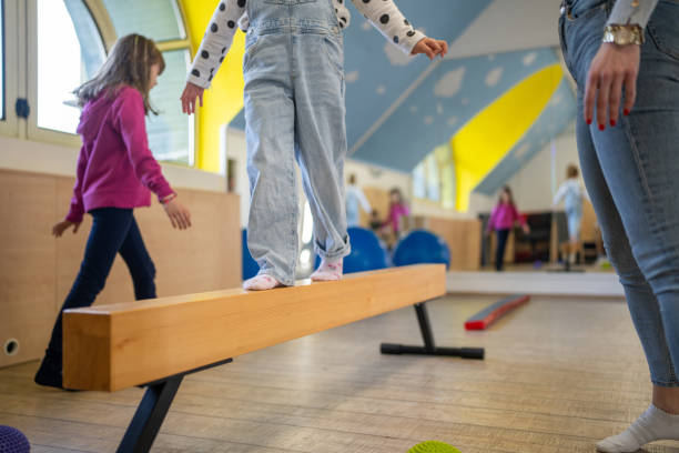 istock Physical therapist working with kids 2088621341