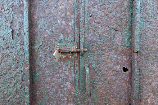 old metal door and padlock