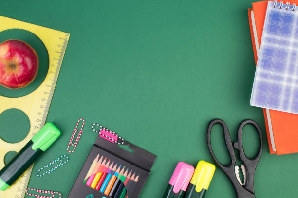 istock Back to school. Stationery on a green table. Office desk with copy space. Flat lay. 2088674185