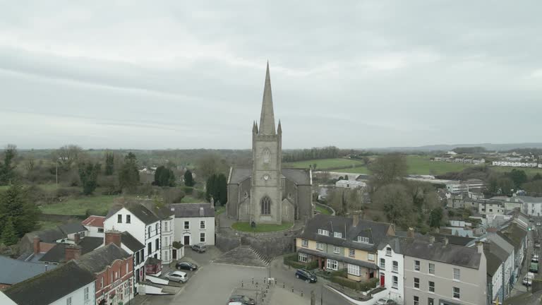 Clones town with historic church, county monaghan, ireland, overcast day, aerial view