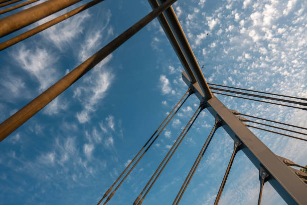 istock modern metal cable bridge on blue sky background at sunset, Lublin 2088755731