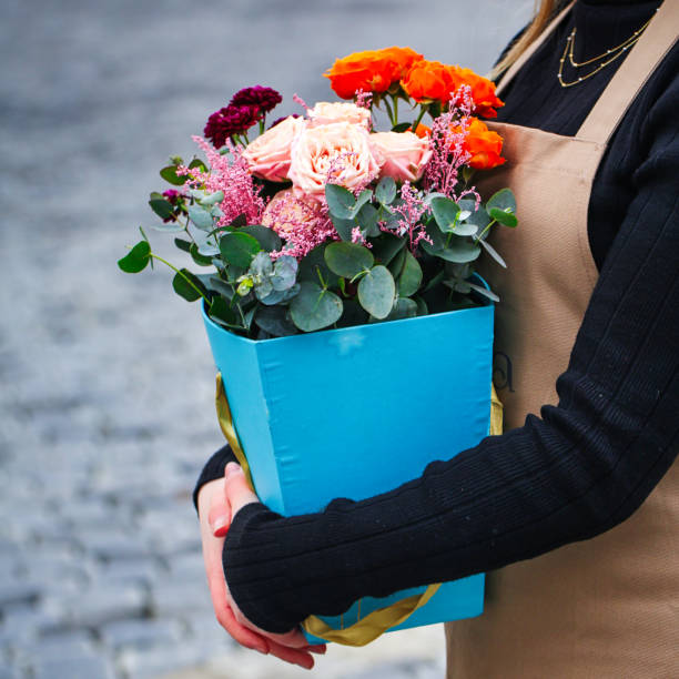 istock Woman Holding Blue Box With Flowers, Copy Space 2088778226