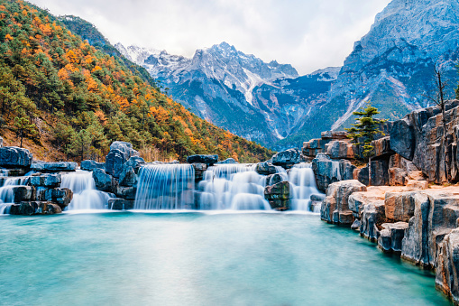 Scenery of Jade Dragon Snow Mountain and Blue Moon Valley Waterfall in Lijiang, Yunnan, China