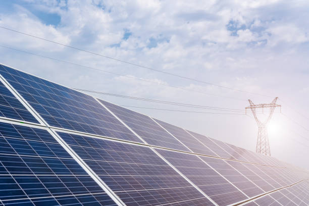 istock Solar photovoltaic panel  and power transmission line 2088841766