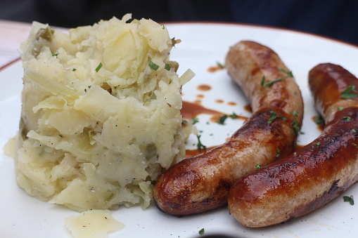 Stoemp (local Belgian food) and sausages at a restaurant in Brussels, Belgium